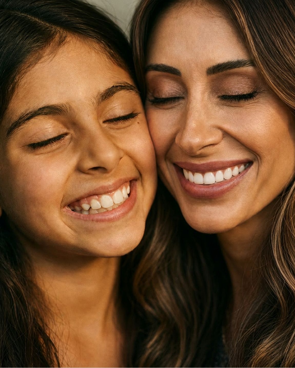 A mother and daughter smiling cheek to cheek, the DAYLY founding family