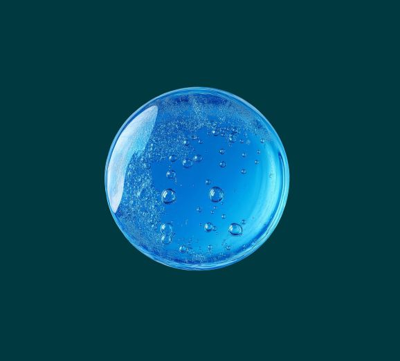 Drop of blue gel representing nano-hydroxyapatite